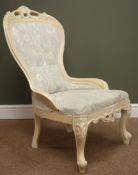 Victorian style limed oak nursing chair, carved cresting rail, upholstered back and seat,