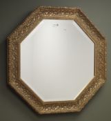 Ornate hexagonal gilt framed bevel edged mirror, W65cm,