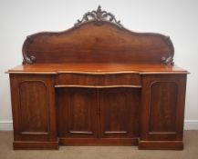Victorian mahogany chiffonier, arched back with floral carved cresting,