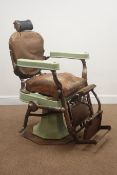 Vintage cast iron Ogee barbers chair, leather upholstered back and seat,
