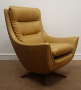 1970's Parker Knoll 'statesman' style vintage retro swivel armchair on teak five point,