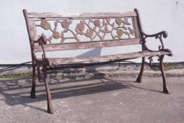 Cast iron garden bench with floral moulded back rest, W127cm,