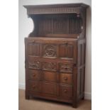 18th century style heavily carved oak secretaire court cupboard,