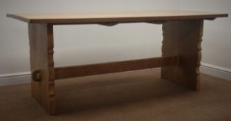 Light oak refectory style dining table, shaped solid end supports joined by single stretcher,