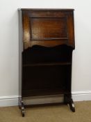 Early 20th century oak escritoire, moulded top, fall front enclosing fitted interior, two shelves,