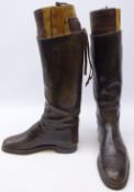 Pair black leather riding boots with wooden trees by Frank Turner