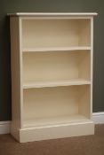 Painted open bookcase, two shelves, plinth base, W76cm, H114cm,