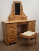Pine kneehole dressing table, eight drawers on bun feet (W127cm, H77cm,
