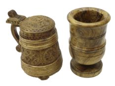 20th century Norwegian Peg Tankard, tapering staved body and lid carved with geometric roundels,