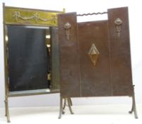 Arts & Crafts hammered copper fire screen on splayed feet,