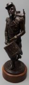 After Emile Guillemin, bronzed spelter figure of a cavalier French drummer,