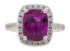 18ct white gold ruby and diamond halo cluster ring, ruby appox 3 carat,