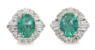 Pair of 18ct white gold oval emerald,