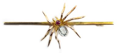 Victorian gold spider brooch set with aquamarine and red/pink stone Condition Report