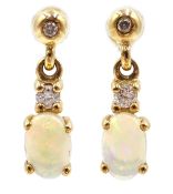 Pair of opal and diamond drop earrings stamped 375 Condition Report <a