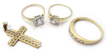 Three 9ct gold stone set dress rings and a similar cross pendant Condition Report