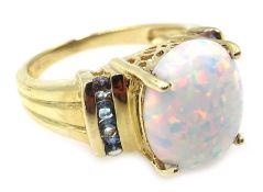 9ct gold opal ring with blue topaz shoulders hallmarked Condition Report size N 4.