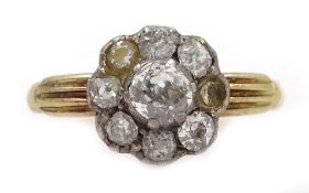 Gold old cut diamond flower set ring stamped 18ct (one stone missing) Condition Report