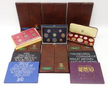 Sixteen British coin year sets including; 1953 in Royal Mint case,