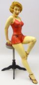 Composition Figure of Marilyn Monroe seated on a bar stool,