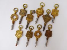 Ten Victorian advertising watch keys including Duggleby Jeweler, J. Eaton Sheffield, J.