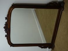 Victorian style carved mahogany overmantle bevel edge mirror, W147cm,