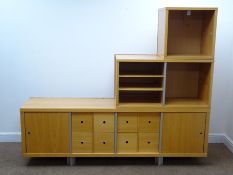 Modern beech split-level staggered wall unit, two adjustable shelves, eight drawers, two cupboards,