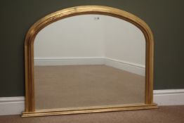 Victorian style gilt framed arched overmantle mirror, W98cm,