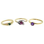 22ct gold ring set with an amethyst, hallmarked, gold ruby and diamond crossover ring,