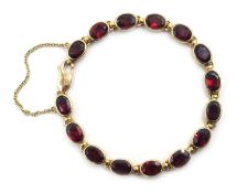9ct gold oval garnet link bracelet, hallmarked Condition Report Approx 18.