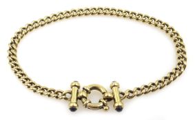 Gold curb link bracelet, the ends set with cabochon sapphires,