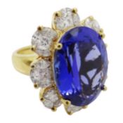 Large 18ct gold oval tanzanite and diamond cluster ring, stamped 750, tanzanite approx 14 carat,