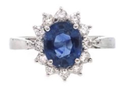 18ct white gold sapphire and diamond cluster ring, hallmarked, sapphire approx 1.