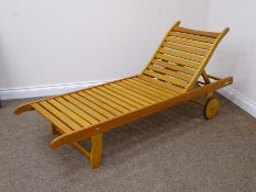 Hardwood adjustable slatted sun lounger,