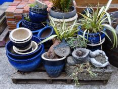 Sixteen various size blue glazed garden pots,