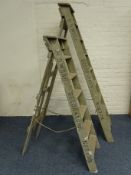 Two vintage decorators ladders (H158cm and H211cm)