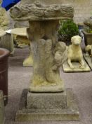 Composite stone log effect bird bath on owl cast square pedestal, H79cm,