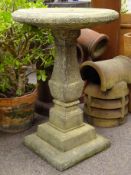 Composite stone bird bath, circular top on baluster stepped column,