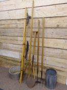 A quantity of vintage garden tools including, a turfing spade, a pitch fork, a hoe,