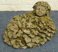 Composte stone leafling child covered with oak leaves and acorns, W70cm, H30cm,