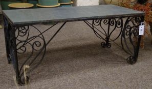Wrought metal garden table with rectangular slate top, 92cm x 42cm,