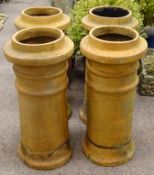 Four chimney pots with ridged detailing, D34cm,