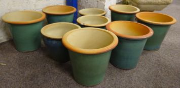 Six tapering pale green glazed terracotta plant pots and three other (9) Condition Report