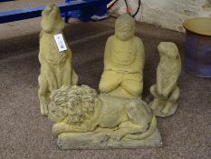 Composite stone garden ornaments of a large seated hare, recumbent lion,