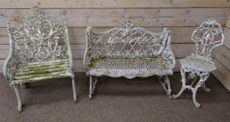 Ornate cast iron garden chair seat and a painted alloy garden bench and similar chair