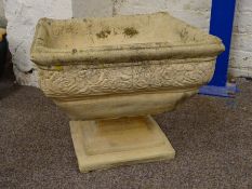 Composite stone square shaped planter urn with rose moulded edge, on stepped square plinth,
