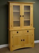 Arts & Crafts style beech bookcase on cupboard, projecting cornice,