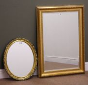 Small oval bevel edge wall mirror in gilt swept frame (W45cm,