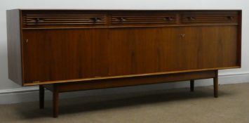 Dalescraft teak sideboard, three drawers above thre cupboard doors, turned out splayed supports,