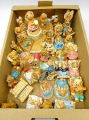Collection of Pendelfin figures and stand,